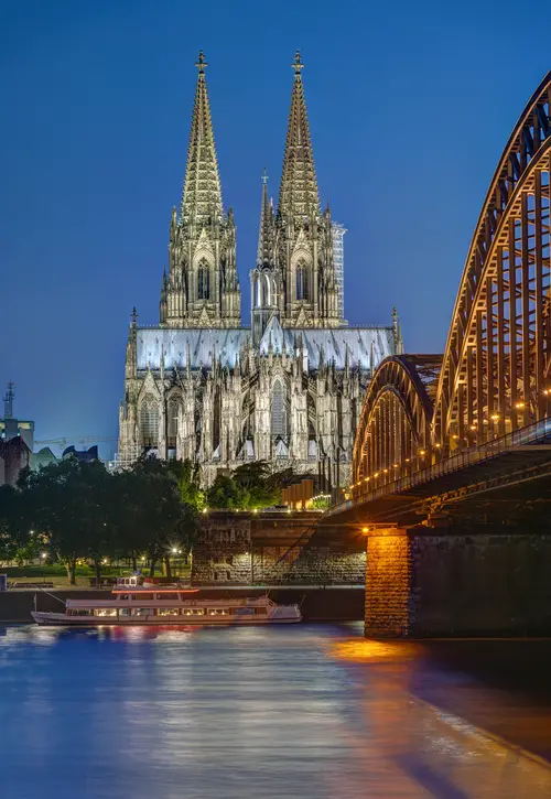The famous Cologne Cathedral and the Hohenzollern railway bridge